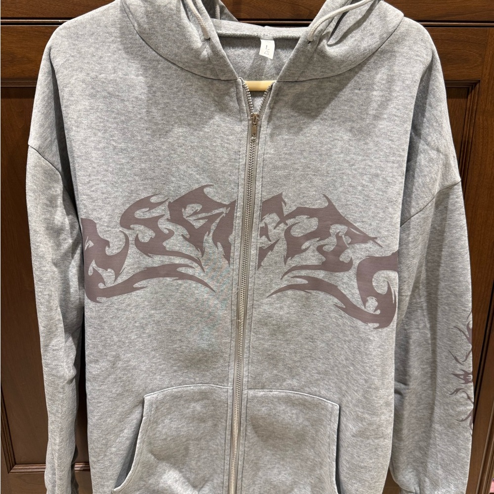 Gray Zip-Up Hoodie with Graphic Design